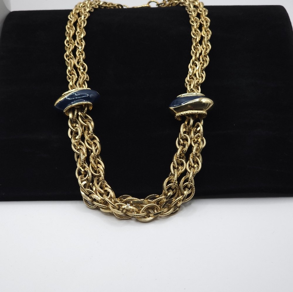 Gold-toned double-stranded‎ metal chain necklace connected by two large spacers